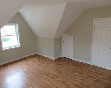 6957 W Fletcher Street - Photo Thumbnail 5