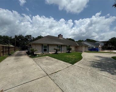 7910 Sands Point Drive - Photo Thumbnail 1
