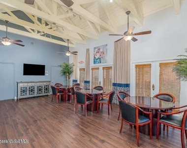 7667 N Wickham Road - Photo Thumbnail 2