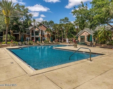 7667 N Wickham Road - Photo Thumbnail 1