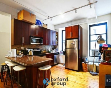 E 26th St. - Photo Thumbnail 3
