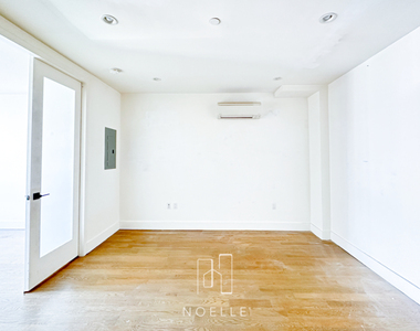282 E 32nd St - Photo Thumbnail 2