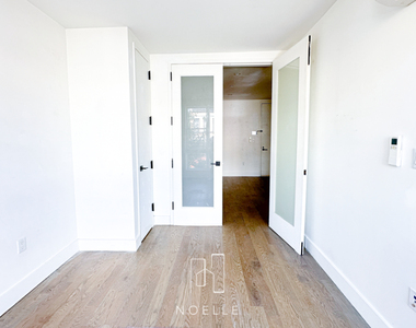 282 E 32nd St - Photo Thumbnail 3