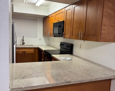 1545 E Sahuaro Drive - Photo Thumbnail 4