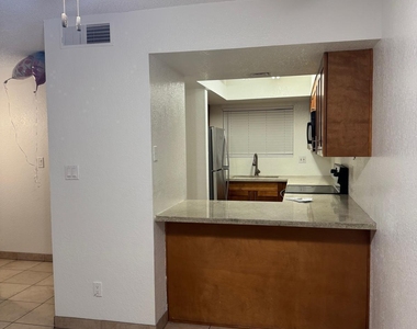 1545 E Sahuaro Drive - Photo Thumbnail 3