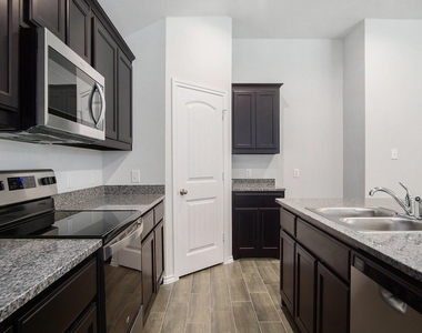 9816 Mescalbean Boulevard - Photo Thumbnail 9