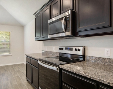9816 Mescalbean Boulevard - Photo Thumbnail 10