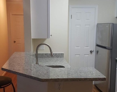 6921 Victoria Drive - Photo Thumbnail 2