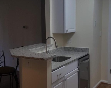 6921 Victoria Drive - Photo Thumbnail 3