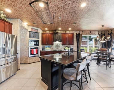 11823 Canyon Mills Drive - Photo Thumbnail 2