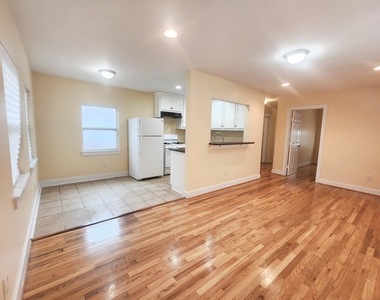 725 E 10th 1/2 Street - Photo Thumbnail 1