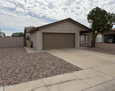 10021 N 47th Drive - Photo Thumbnail 1
