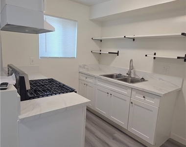 1240 S N San Gabriel Avenue - Photo Thumbnail 4