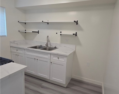 1240 S N San Gabriel Avenue - Photo Thumbnail 5