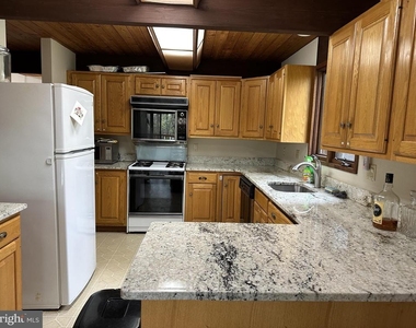 6022 Munson Hill Road - Photo Thumbnail 18