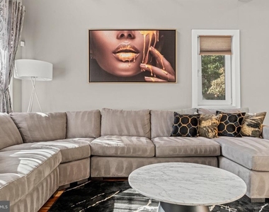 1124 N American Street - Photo Thumbnail 2