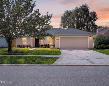 12838 Chets Creek Drive N - Photo Thumbnail 2