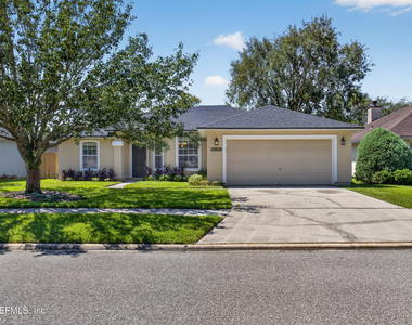 12838 Chets Creek Drive N - Photo Thumbnail 1