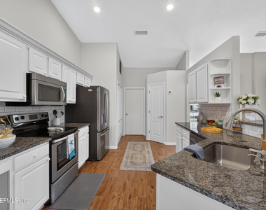 12838 Chets Creek Drive N - Photo Thumbnail 24