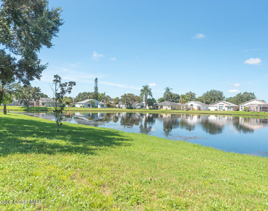 7033 Hammock Trace Drive - Photo Thumbnail 1