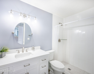 7667 N Wickham Road - Photo Thumbnail 14