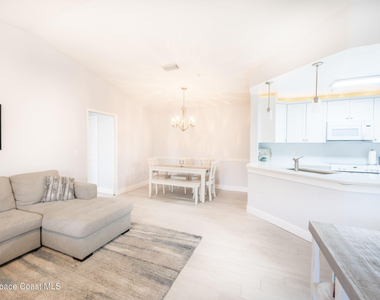 7667 N Wickham Road - Photo Thumbnail 10
