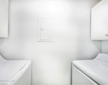 7667 N Wickham Road - Photo Thumbnail 4