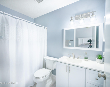 7667 N Wickham Road - Photo Thumbnail 9