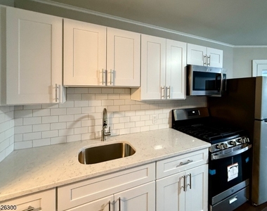 672 Mount Hope Ave - Photo Thumbnail 1