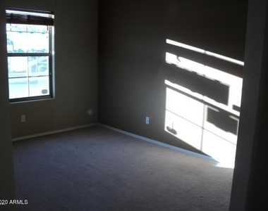 8909 S 58th Lane - Photo Thumbnail 8