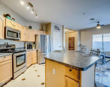 14833 W Charter Oak Road - Photo Thumbnail 1