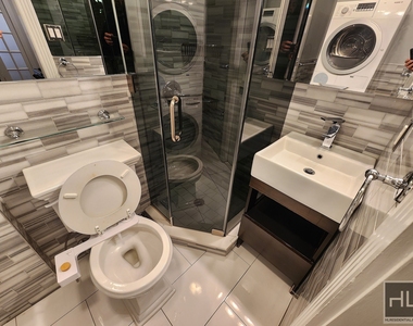 W 53rd St. - Photo Thumbnail 4