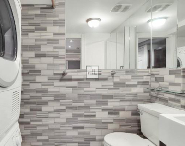 W 53rd St. - Photo Thumbnail 3