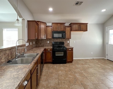 7719 Bennie Terrace - Photo Thumbnail 5