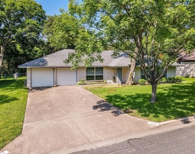 11012 Alhambra Dr - Photo Thumbnail 2