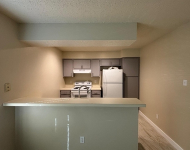 4609 E 12th St - Photo Thumbnail 1
