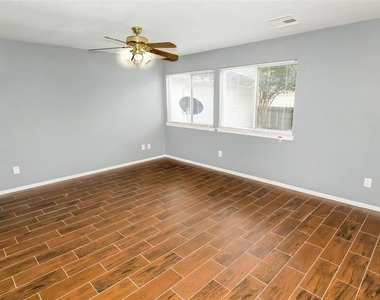 6127 Lone Prairie Way - Photo Thumbnail 4