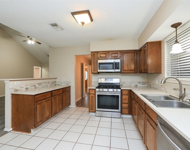 9130 Kirkleigh Street - Photo Thumbnail 10