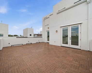 327 E 2nd Street - Photo Thumbnail 38