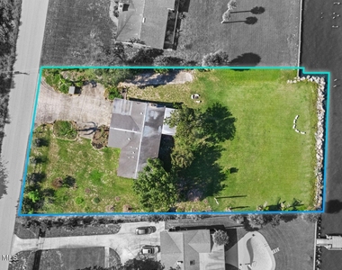 6785 Riveredge Drive - Photo Thumbnail 2