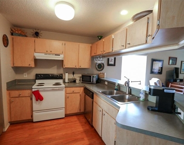 7512 S Mascotte Street - Photo Thumbnail 6