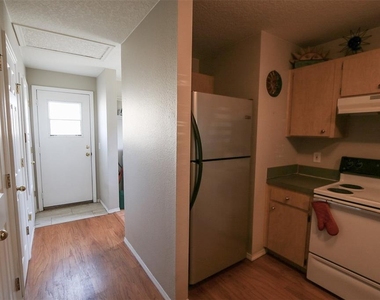 7512 S Mascotte Street - Photo Thumbnail 8