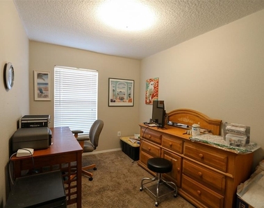 7512 S Mascotte Street - Photo Thumbnail 11