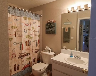 7512 S Mascotte Street - Photo Thumbnail 15