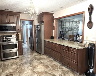 8834 Whispering Oaks Trail - Photo Thumbnail 6