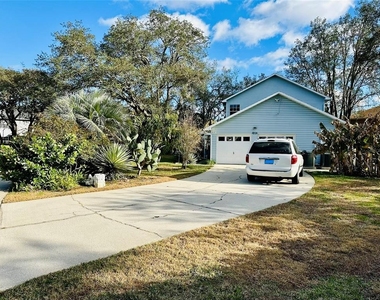 8834 Whispering Oaks Trail - Photo Thumbnail 4