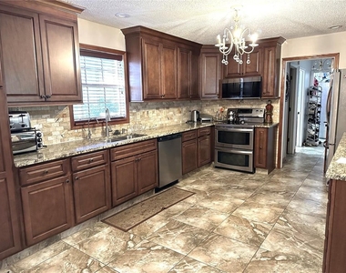 8834 Whispering Oaks Trail - Photo Thumbnail 5