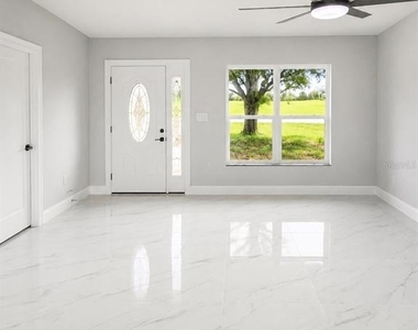 7016 Golf Club Drive - Photo Thumbnail 3