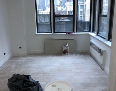 E 23rd St. - Photo Thumbnail 5