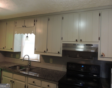 6336 Phillips Place - Photo Thumbnail 10